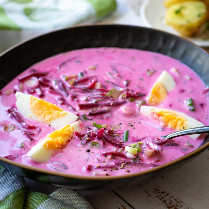 Lithuanian Cold Beetroot Soup in a black bowl.
