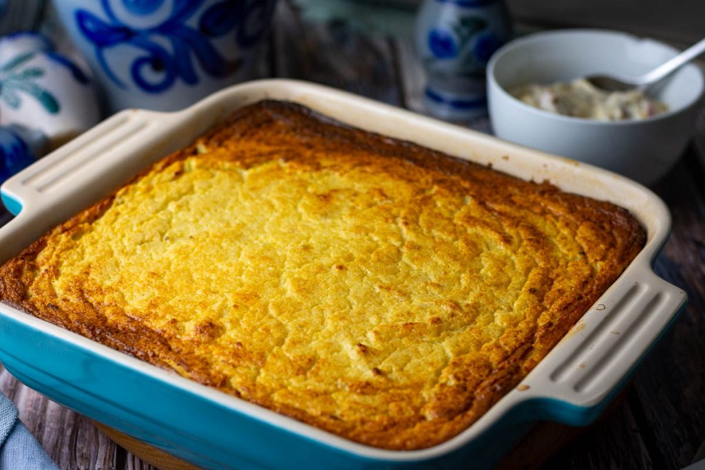 Lithuanian Potato pudding is baked and golden brown on top.