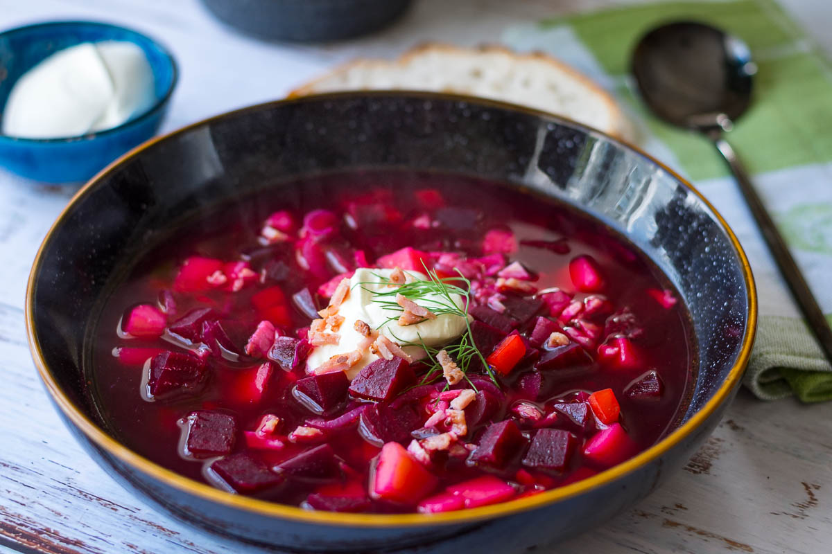Lithuanian beet soup with sour cream and bacon on top. 