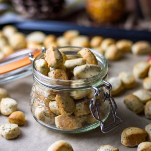 Lithuanian Christmas Eve Biscuits in a mason jar on a baking tray.
