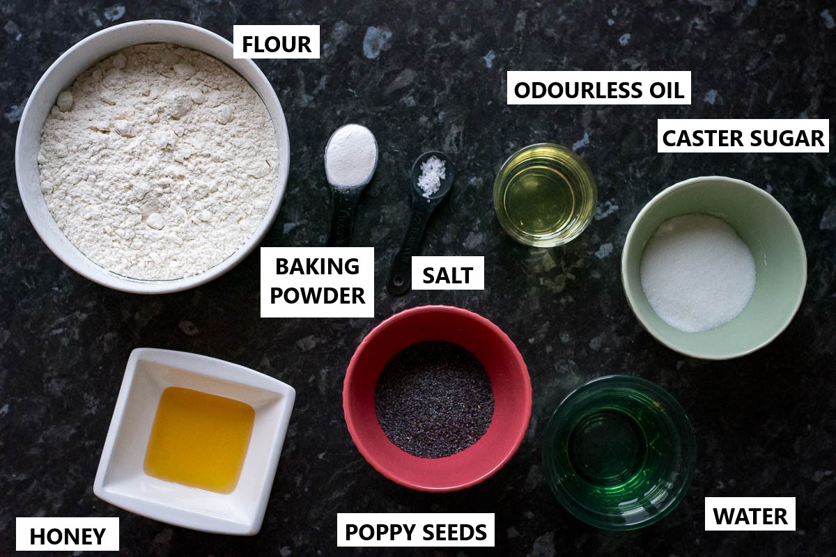 Ingredients for Lithuanian Christmas Eve Biscuits (a.k.a. Kuciukai) on a dark kitchen worktop.