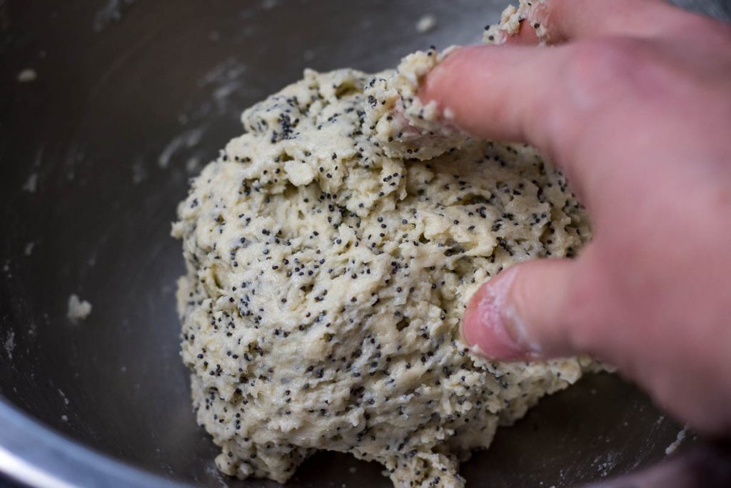 bringing the dough into a ball.