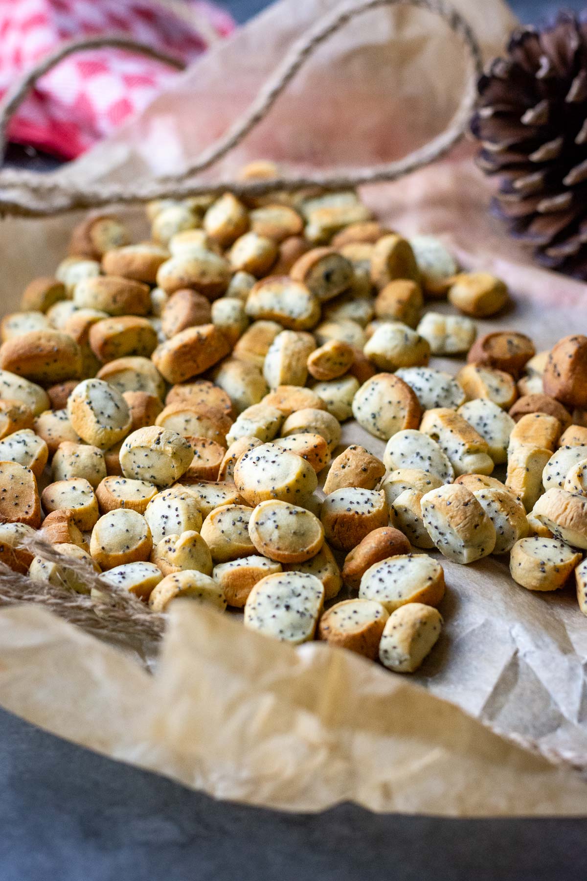 Lithuanian Yeasted Christmas Eve Cookies on a baking paper sheet.