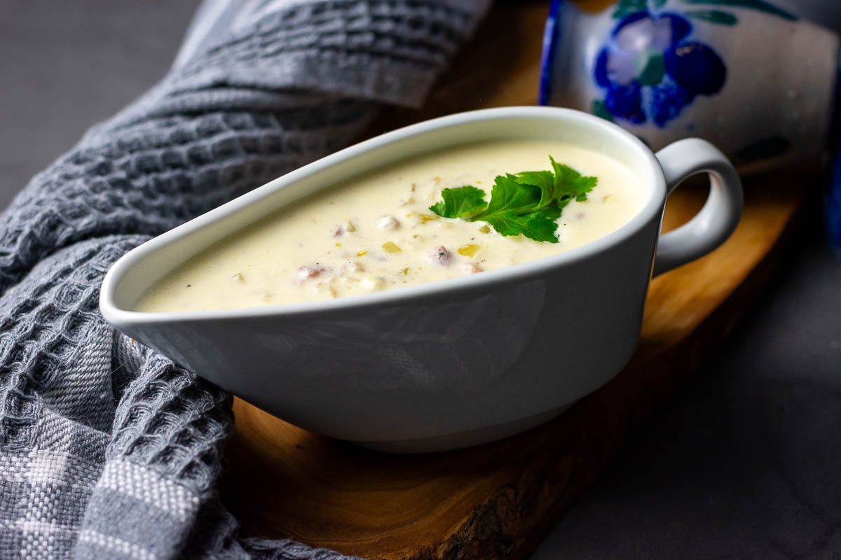Sour cream Sauce with Bacon in a gravy boat.