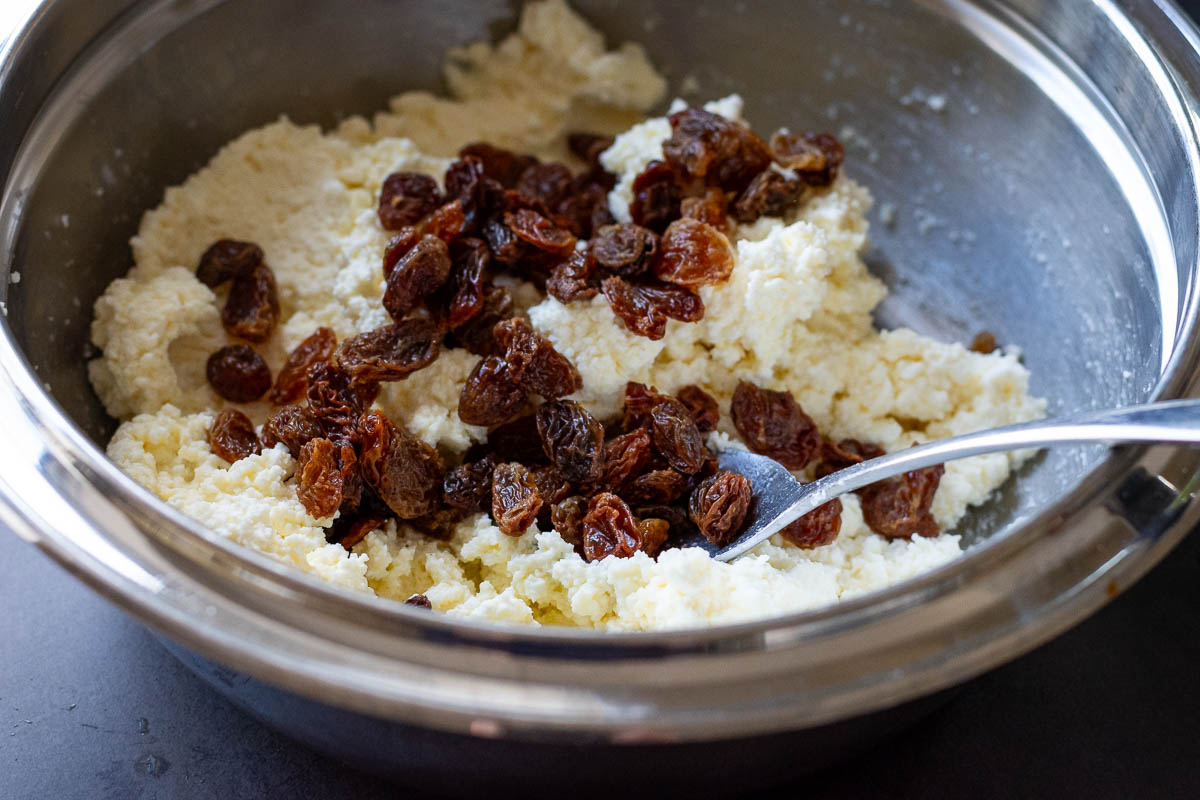 Drained sultanas added to the farmers cheese pancake mix. 