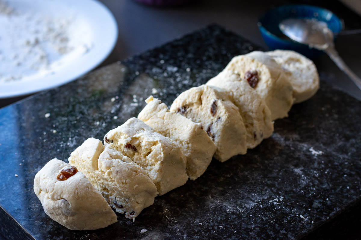 The log of pancake dough cut into 8 pieces. 