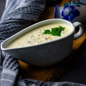 Sour cream Sauce with Bacon in a gravy boat.
