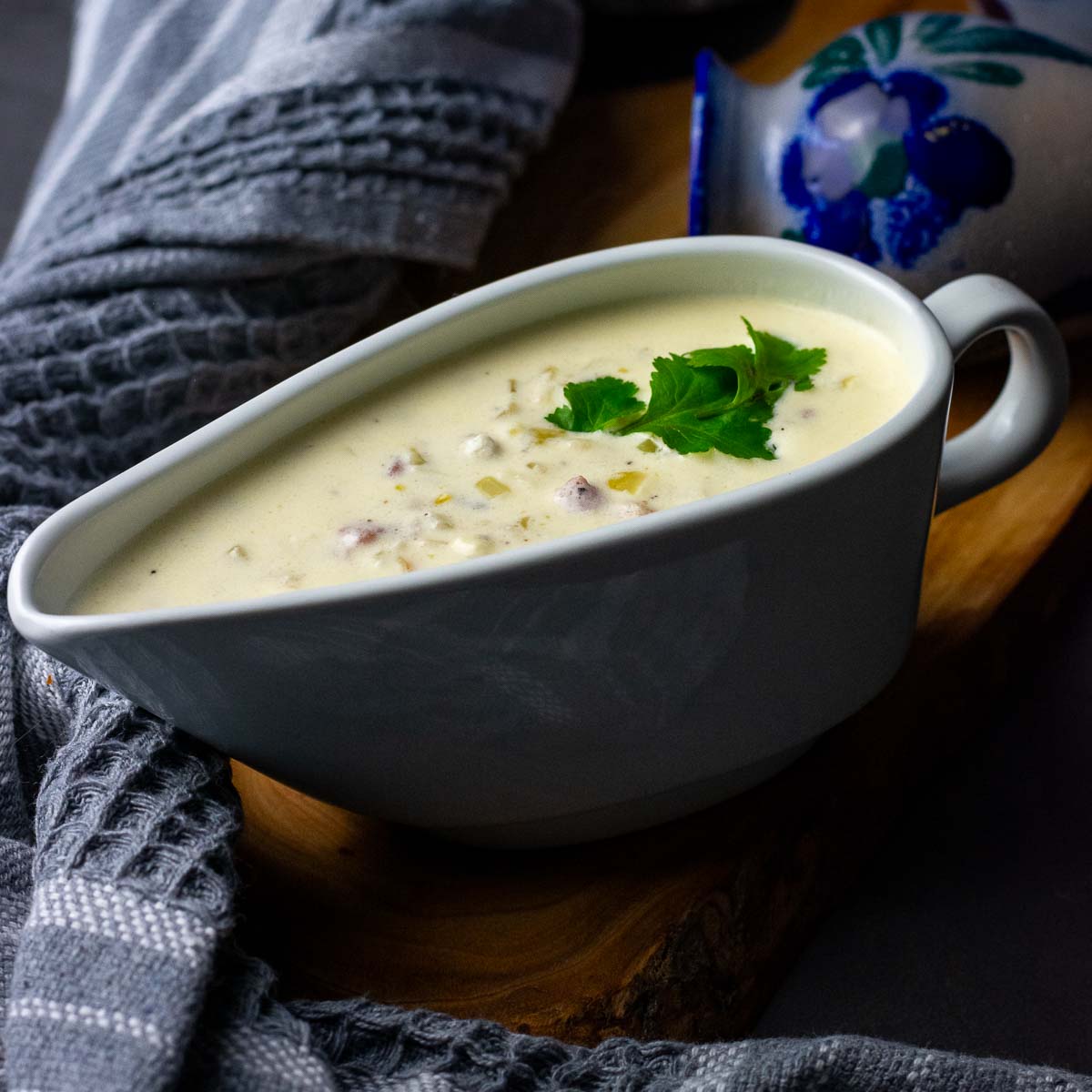 Sour cream Sauce with Bacon in a gravy boat.
