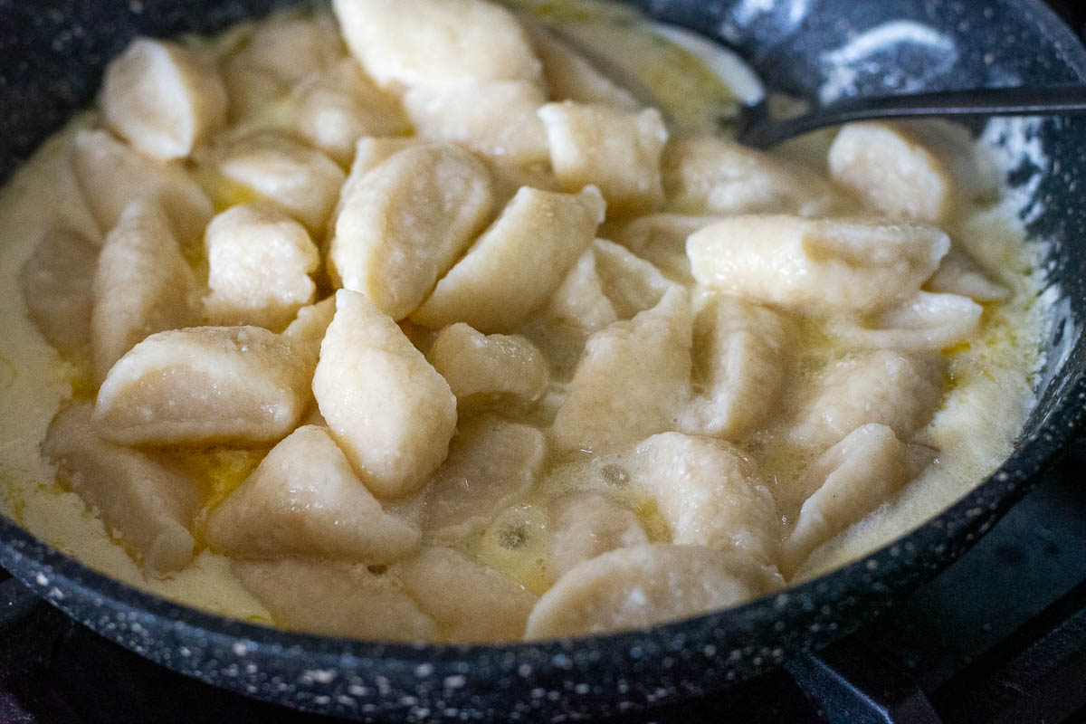 Farmers cheese dumplings added to the sour cream and butter sauce. 