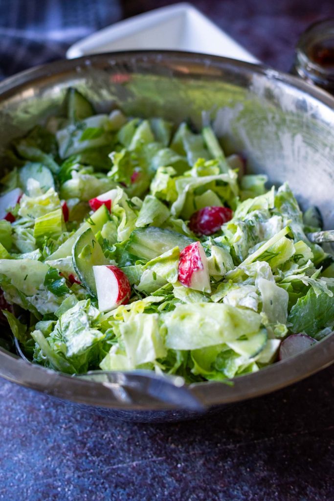 Lithuanian summer salad mixed with sour cream. 