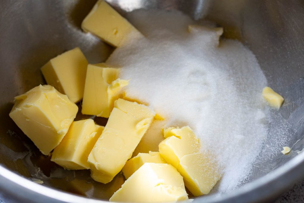 Butter, sugar and salt in a large metal mixing bowl.