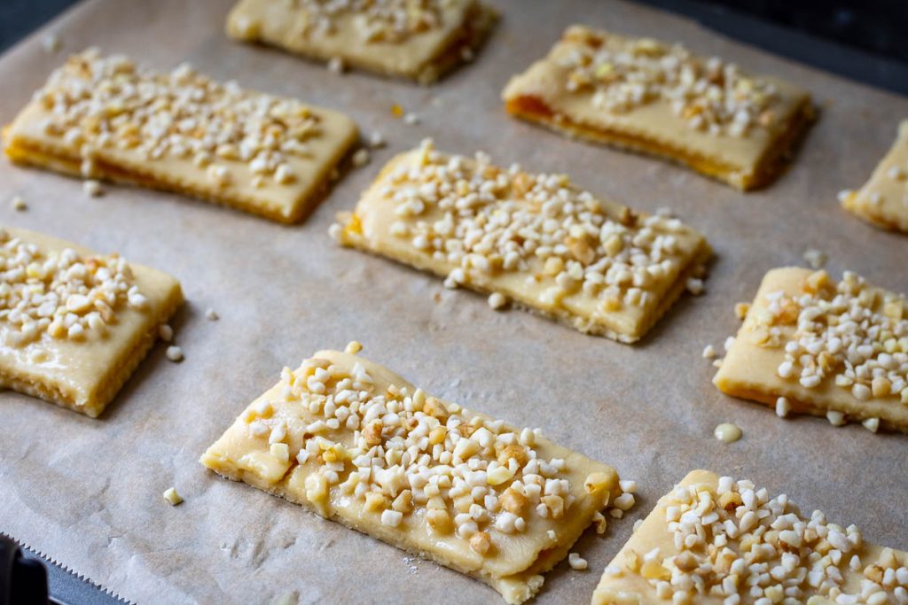 Nuts scaterred on top of the Lithuanian cookies.