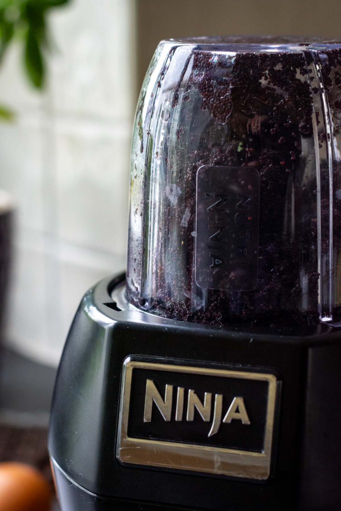 Blitzing the soaked poppy seeds in a powerful smoothie maker. 