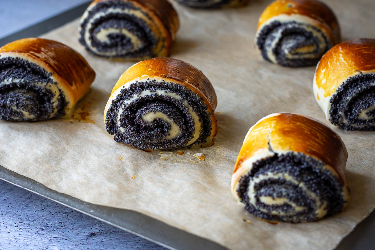 Baked poppy seed rolls freshly out of the oven. 