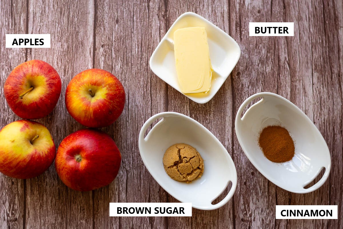 Apple filling ingredients on a wooden surface.