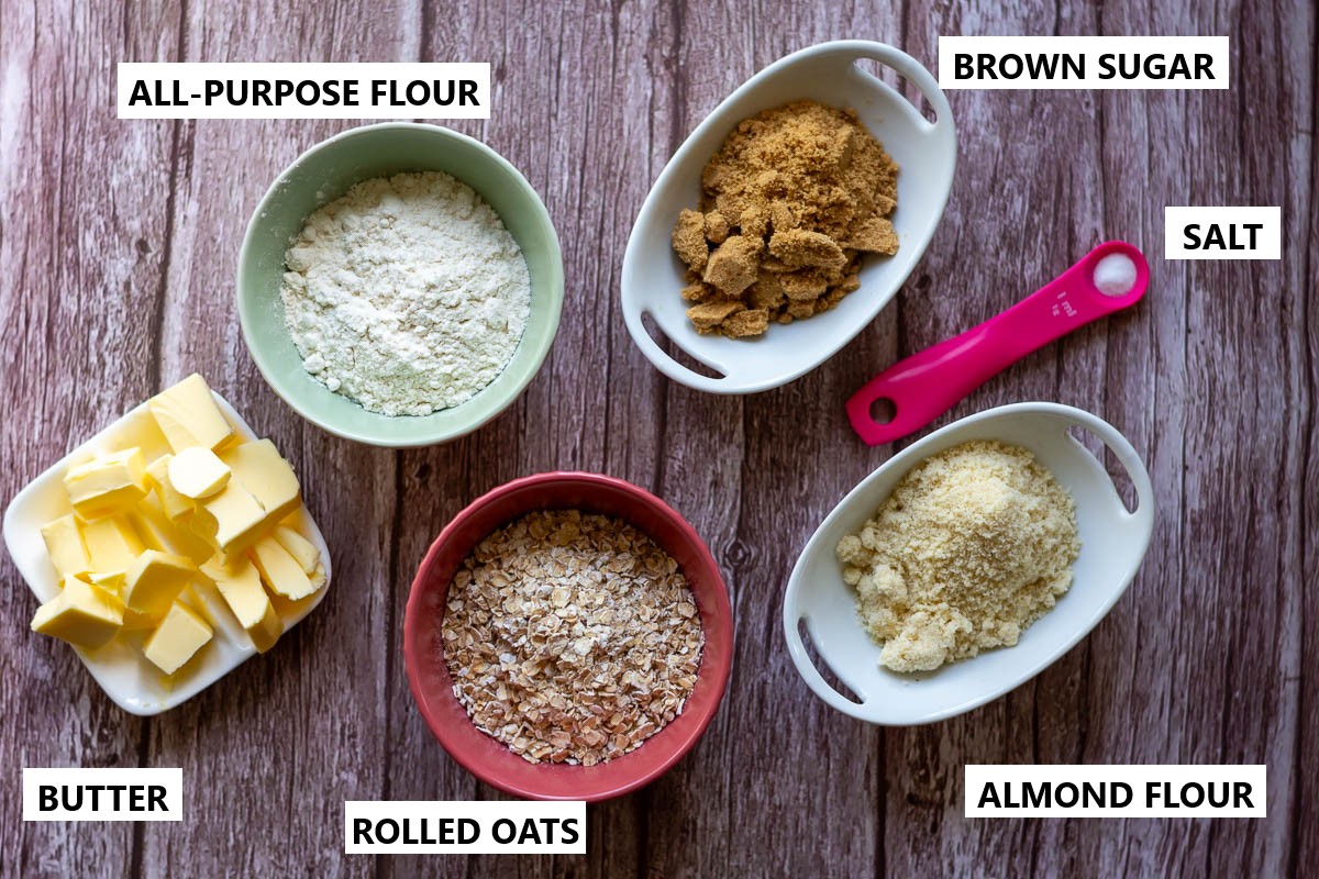 Ingredients for the crumble topping on a wooden table.