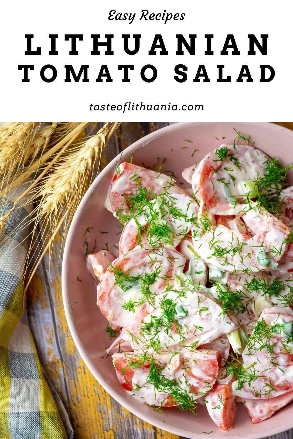 Lithuanian Tomato Salad with sour cream and green onions in a pink bowl with text overlay.