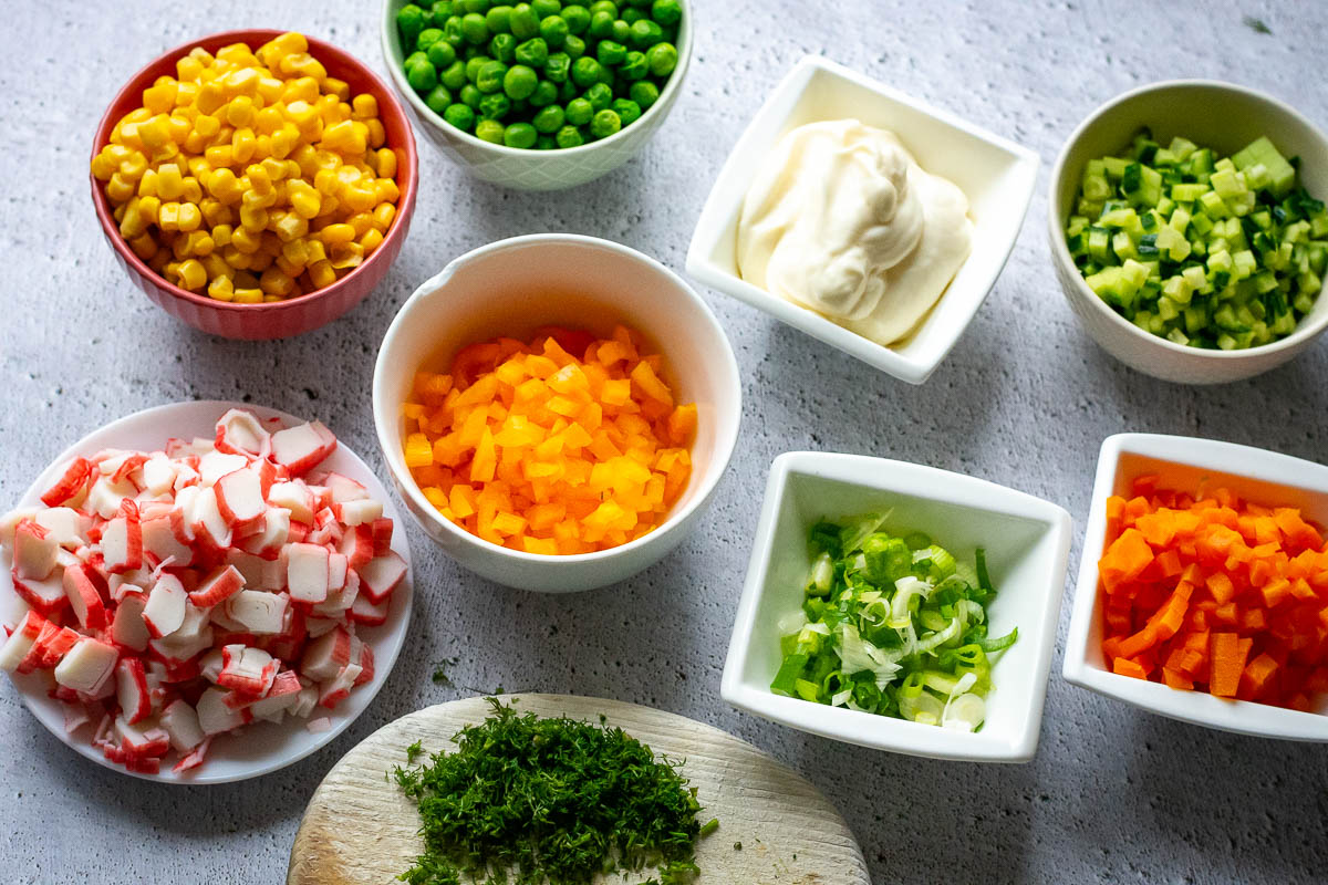 All ingredients weighed out and chopped on a light grey surface.
