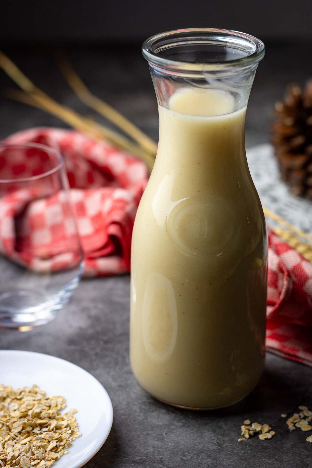 Fermented oat kissel in a carafe.