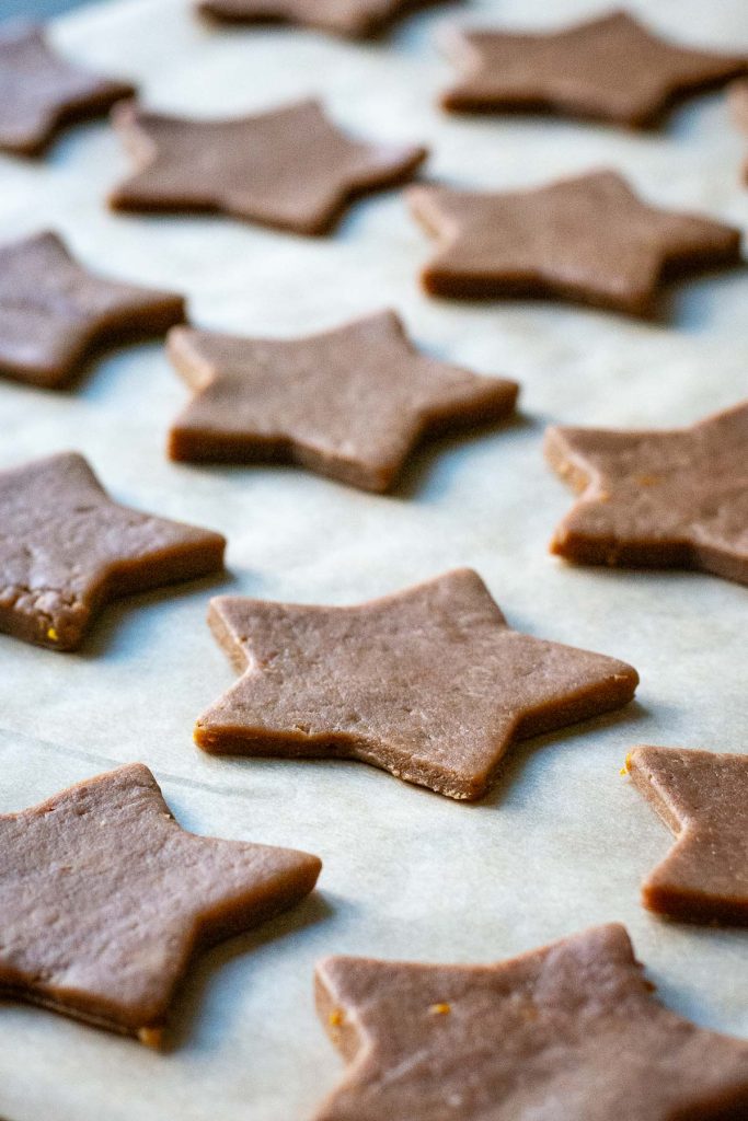 Lithuanian Christmas cookies arranged o na baking sheet. 