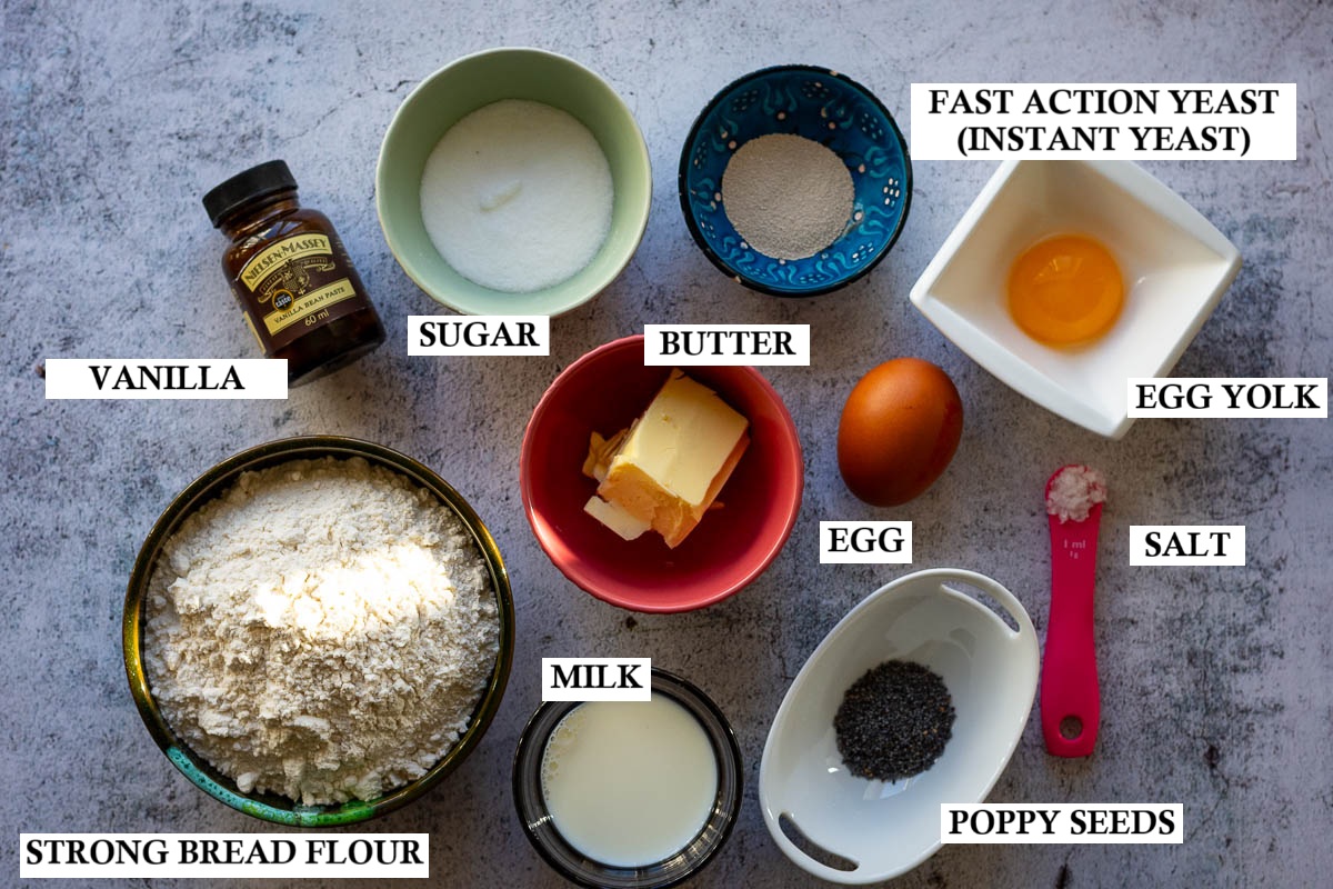 Ingredients for Braided Easter Bread on light grey surface.