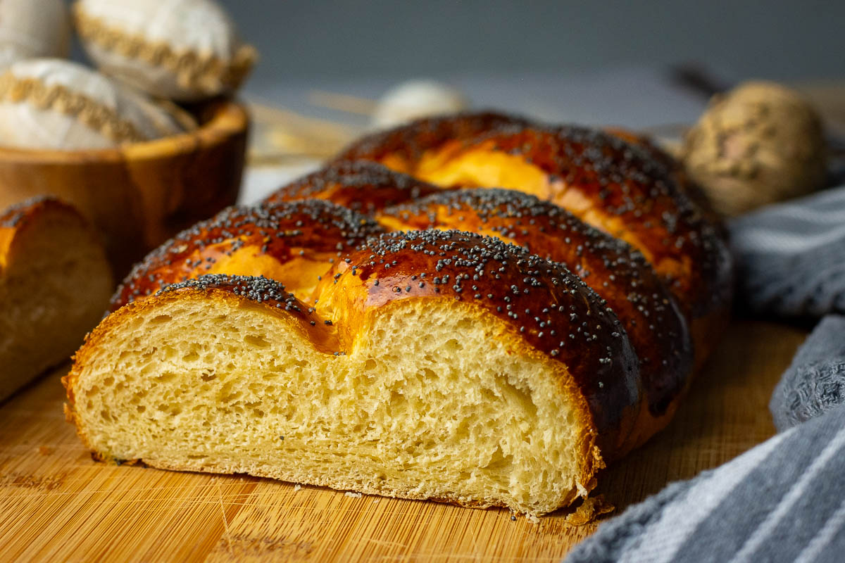 Cut Lithuanian Easter bread showing soft and fluffy cross section. 