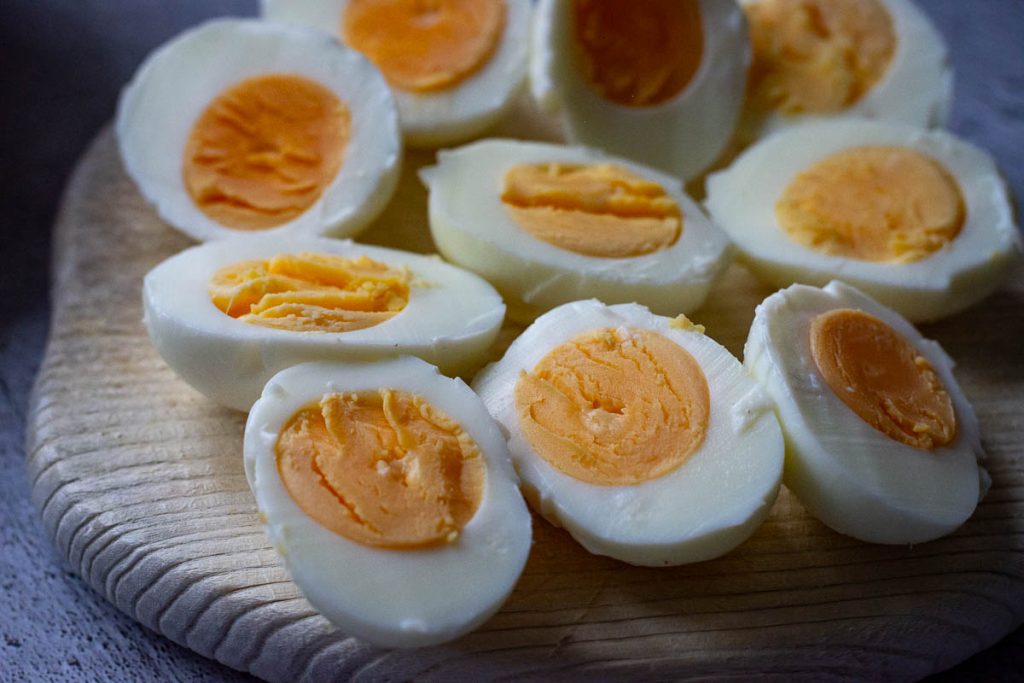 Halved hard-boiled eggs. 