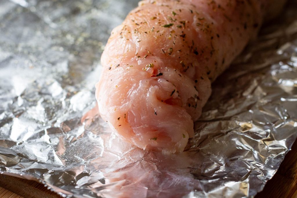 The ends of the roulade tucked in to seal the filling.