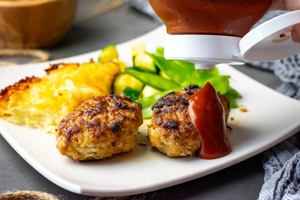 Lithuanian meatballs with ketchup.