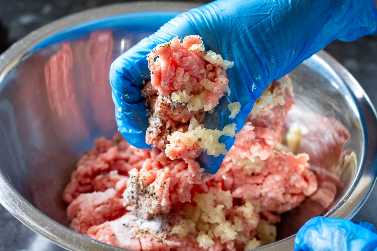 Making pork filling for Lithuanian zeppelins.