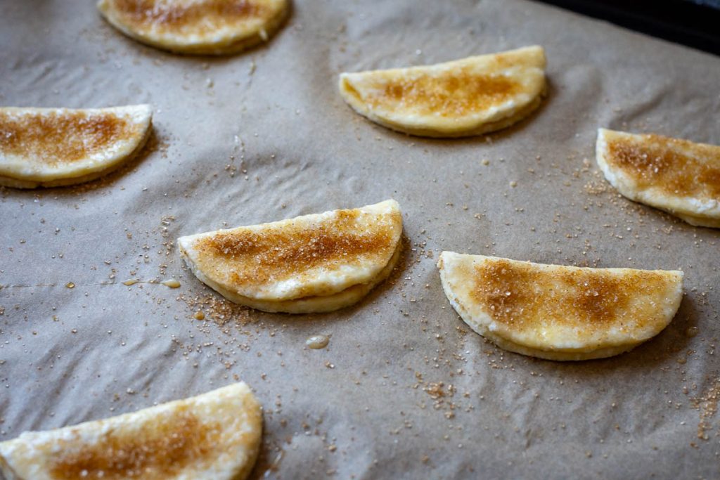 Cinnamon Sugar sprinkled over the half-moon shaped cookies.