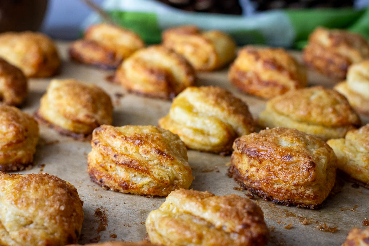 Lithuanian cookies made with farmer's cheese on a baking sheet.