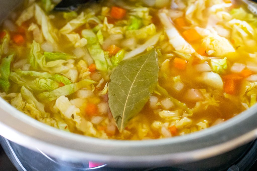 Stock poured over the lithuanian cabbage soup.