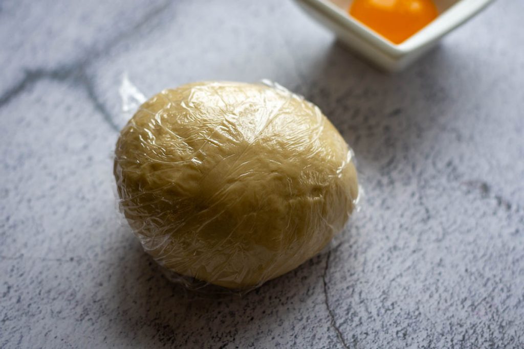 Dumpling dough wrapped in plastic wrap.