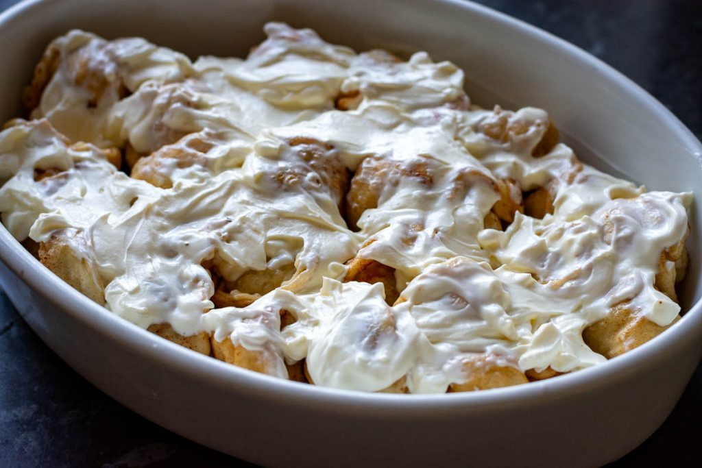 Sour cream smeared on top of the dumplings. 