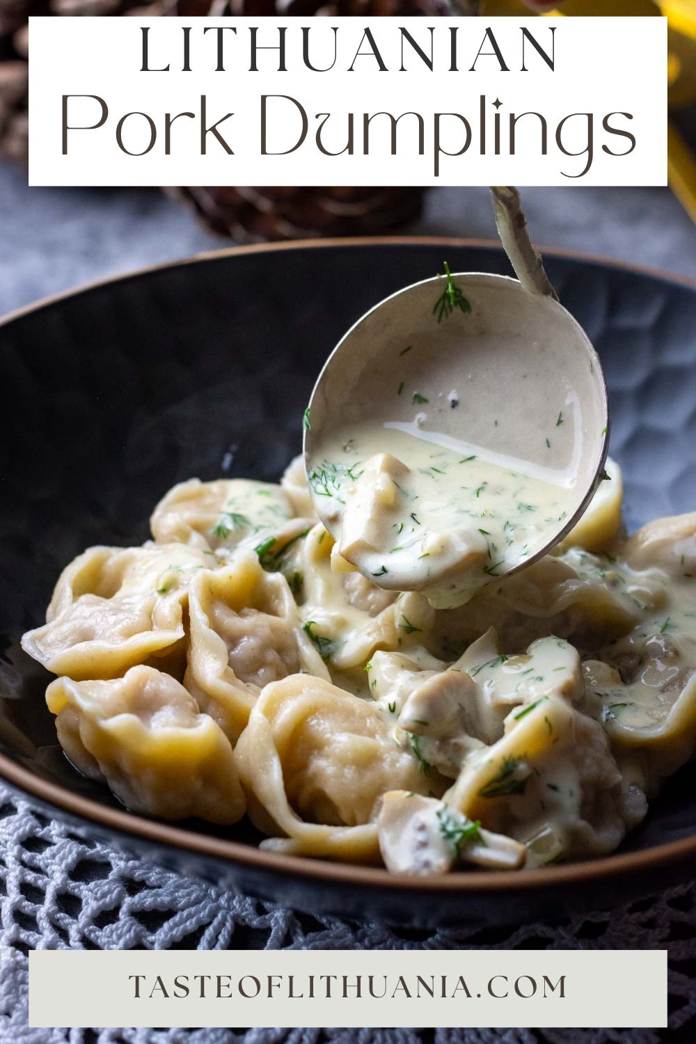 Boiled Lithuanian Pork Dumplings being topped with creamy mushroom sauce - Pin for Pinterest. 