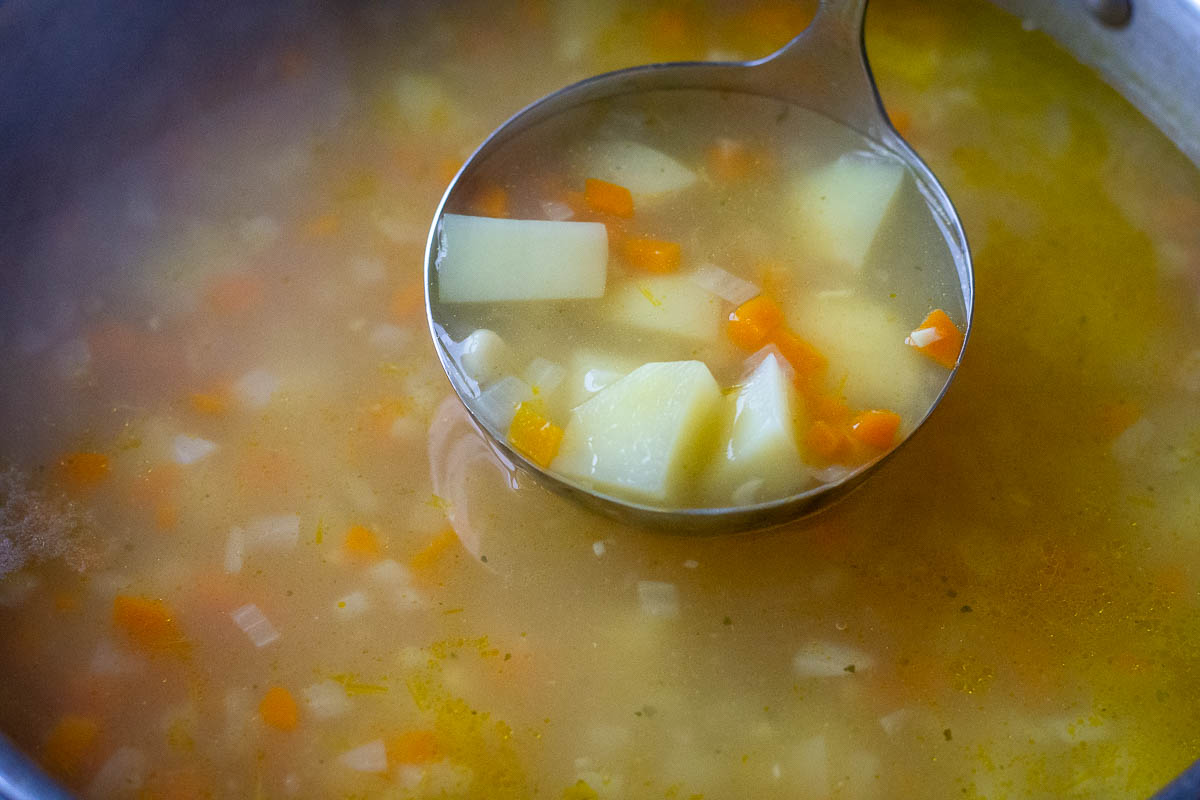 A ladelful of LIthuanian bean soup. 