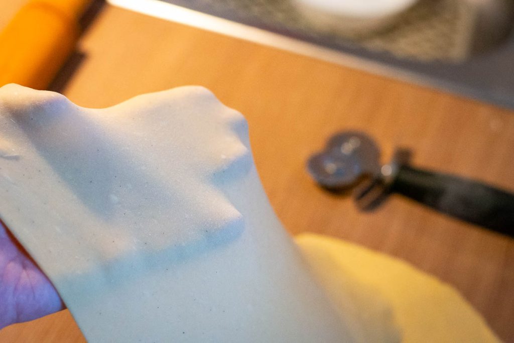 The dough is rolled so thin that you can see through it.