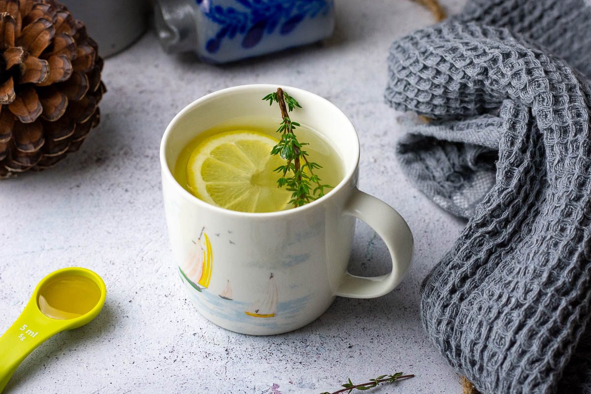 Thyme tea for cough made with fresh thyme, lemon and ginger. 
