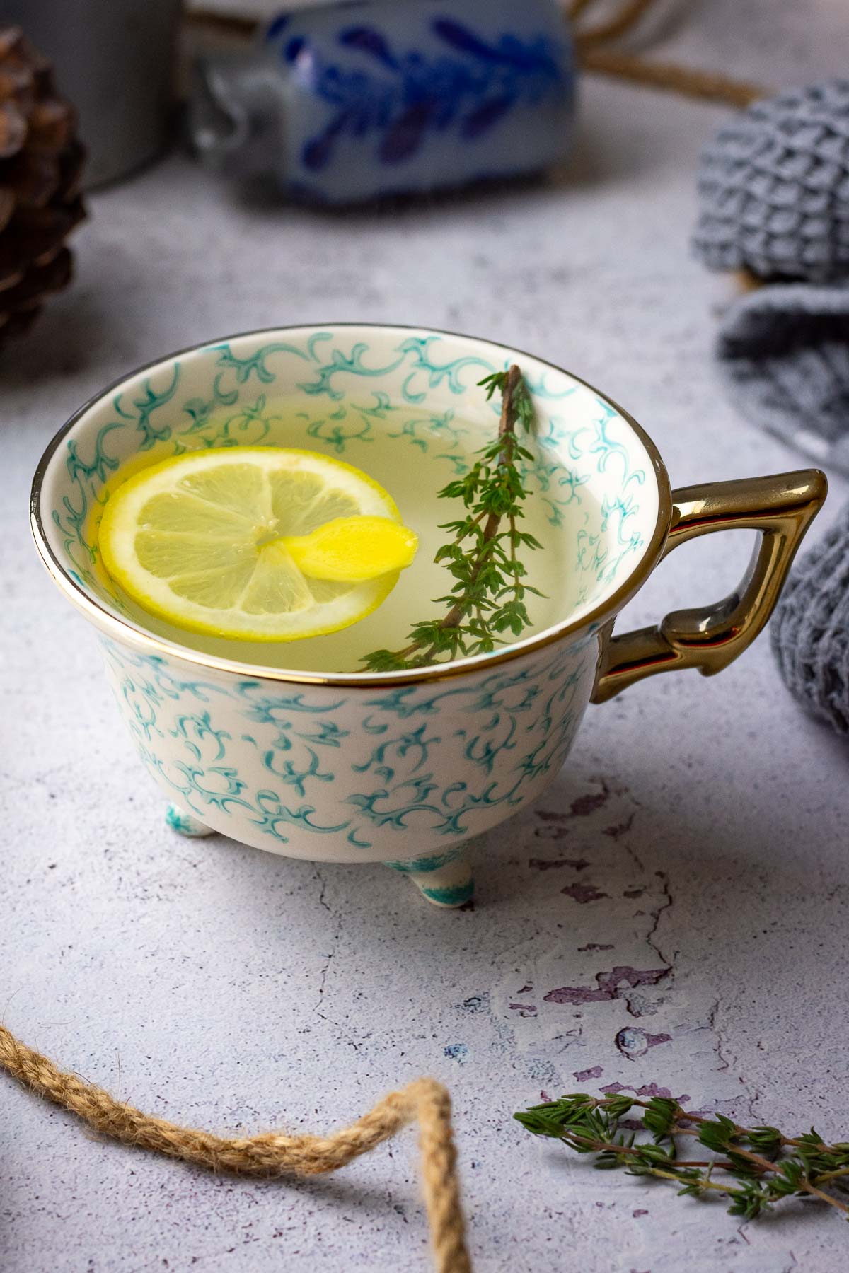 Lithuanian thyme infusion with a slice of lemon and ginger. 
