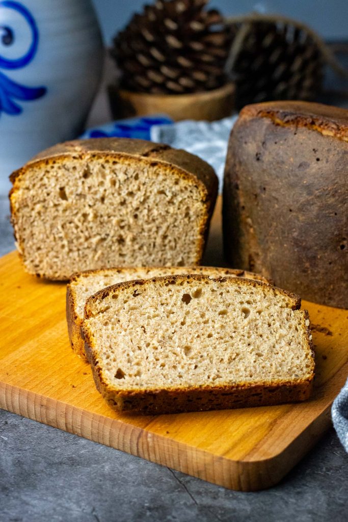 Sliced Lithuanian Rye Bread on a wooden board.