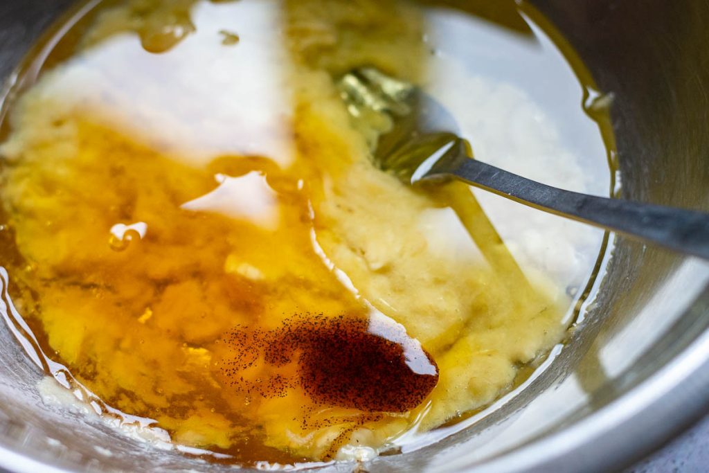 Mixing wet ingredeints for Lithuanian Cookies for Lent. 