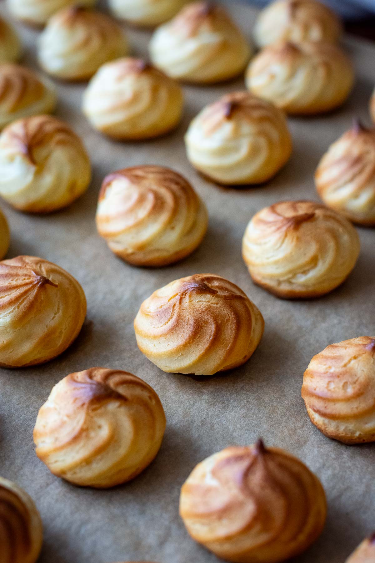 Lithuanian cookies cooling on a baking sheet.