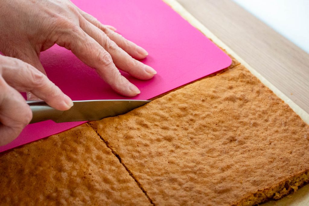 Cuting the honey into 4 rectangles.