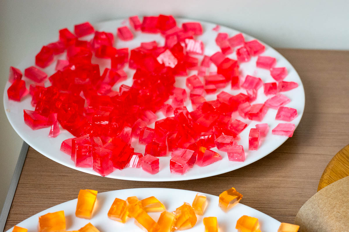 Jello cut into cubes on plates.