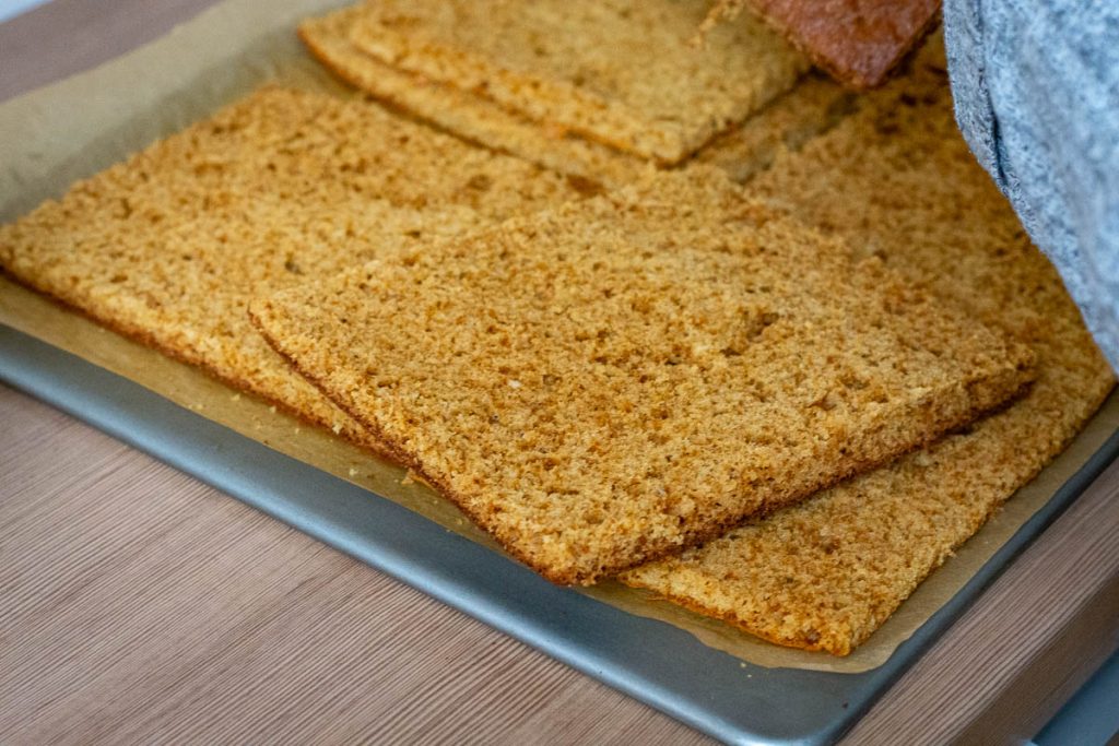 Honey cake layers on a baking sheet.