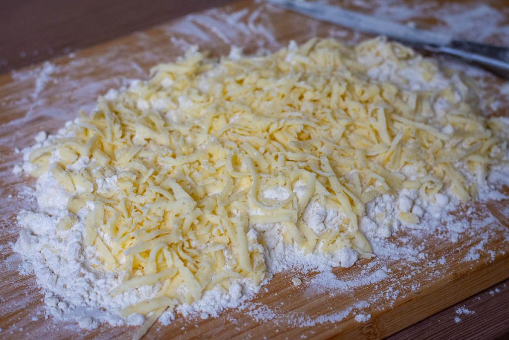 Cheese and sour cream spread on the flour and butter mixture. 