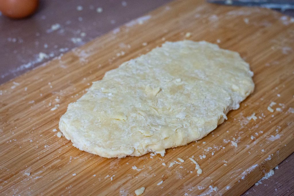 Flattened out pastry for cheese straws. 