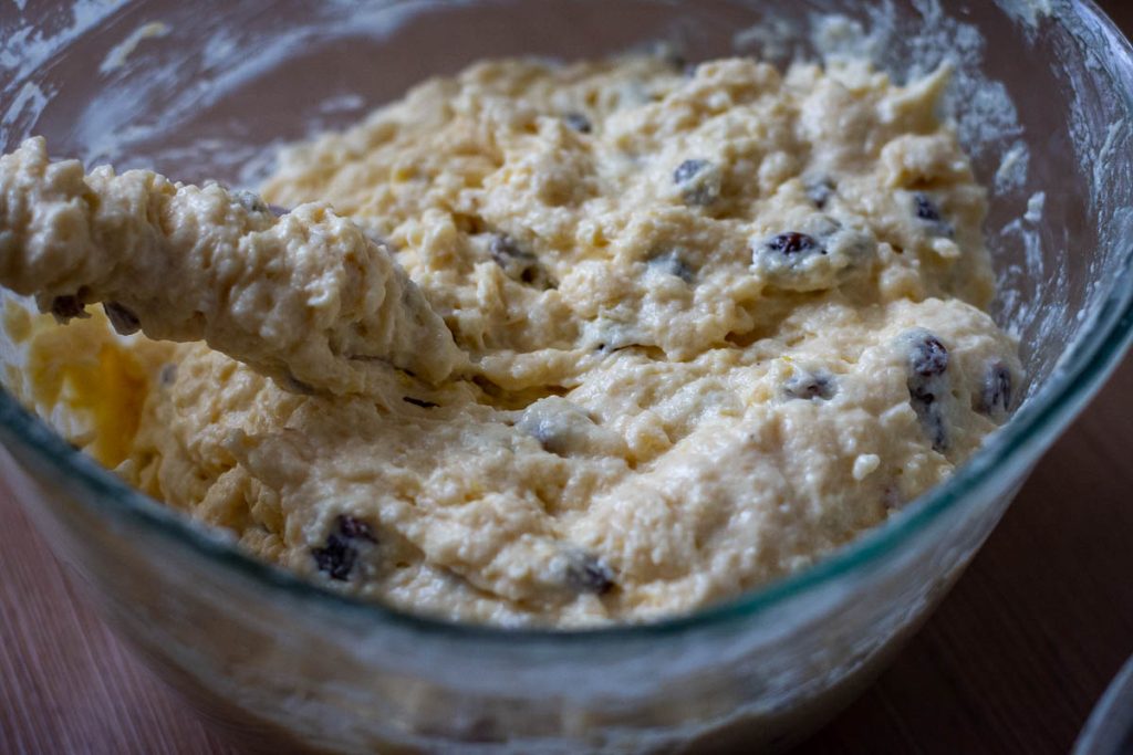 Folding egg white into the cake batter.