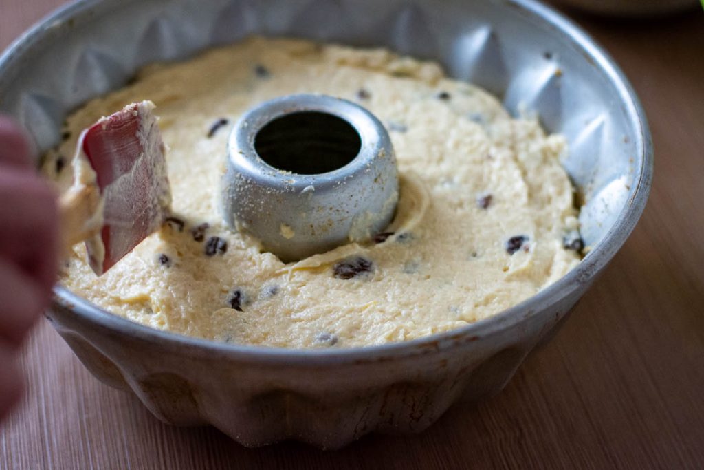 Lithuanian farmer's cheese cake batter in a prepared bundt cake pan.